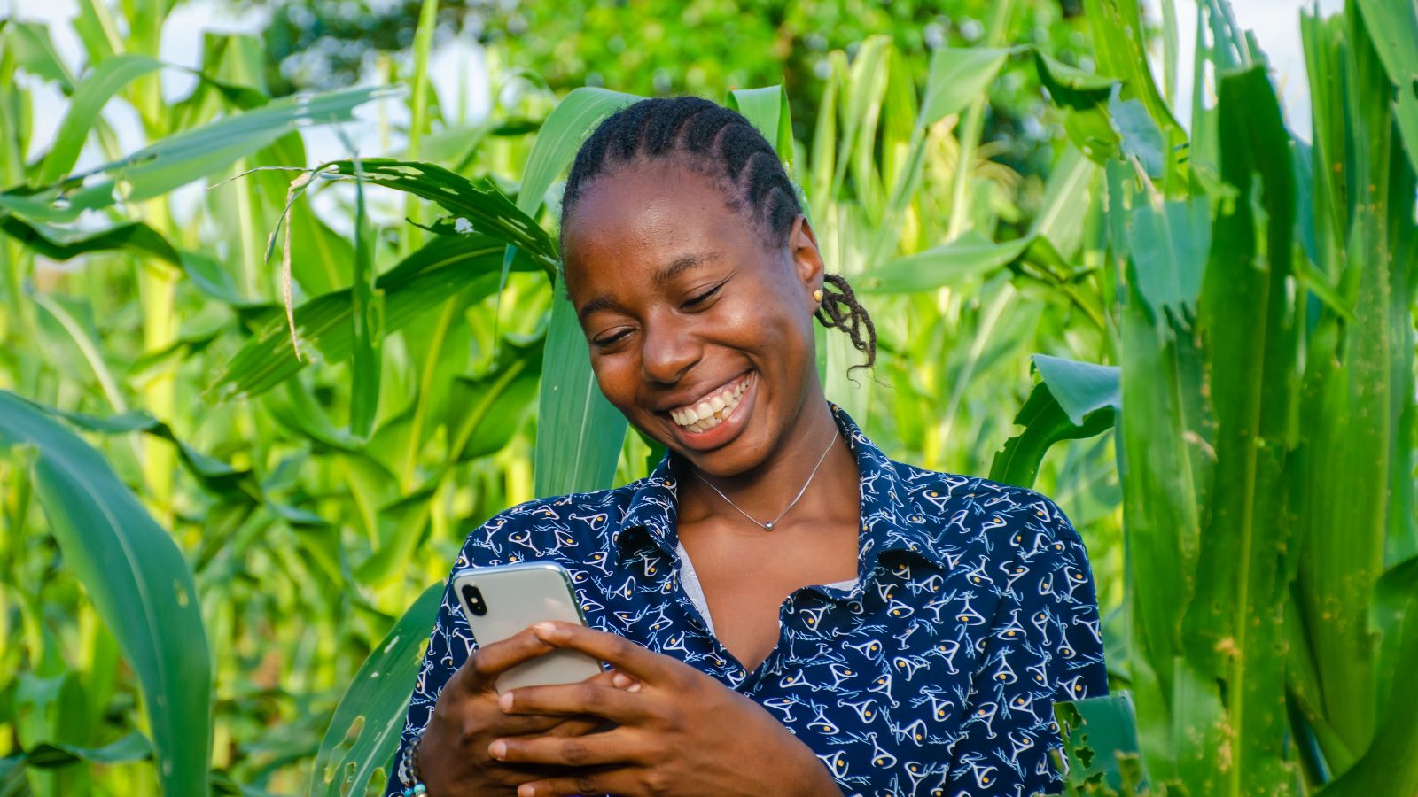 A woman farmer on her phone