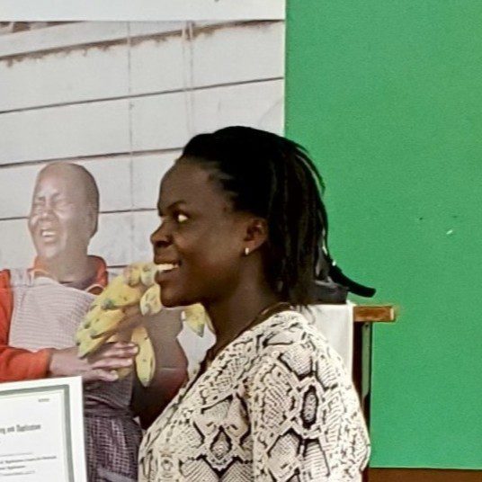 Nassuna Judith receiving her certificates